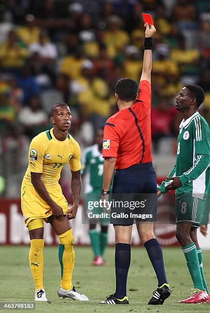 Moeneeb Josephs of South Africa receives a Red card from Referee Mohamed Benouza during the 2014 African Nations Championship match between South...