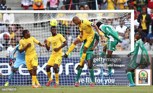 South African captain Benett Nthete heads the ball towards the goal during the 2014 African Nations Championship match between South Africa and...