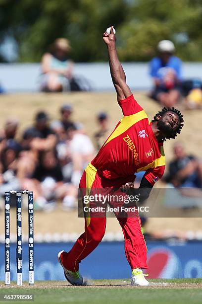 Solomon Mire of Zimbabwe bowls during the 2015 ICC Cricket World Cup match between Zimbabwe and the United Arab Emirates at Saxton Field on February...