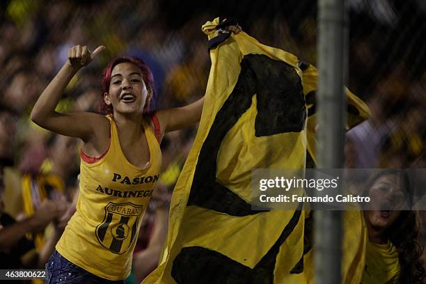 Fan of Guarani cheers for her team during a match between Guarani and Sporting Cristal as part of Copa Bridgestone Libertadores 2015 at Rogelio...