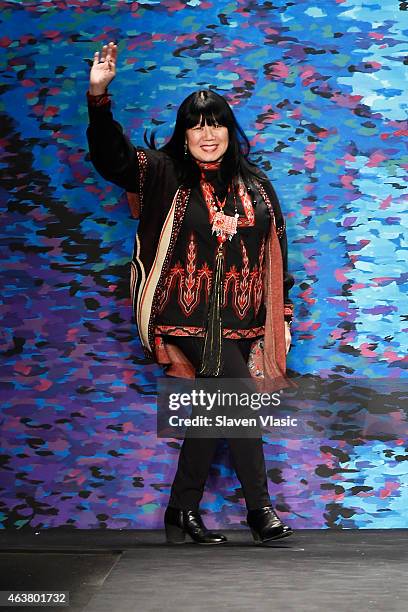 Designer Anna Sui poses on the runway at the Anna Sui fashion show during Mercedes-Benz Fashion Week Fall at The Theatre at Lincoln Center on...