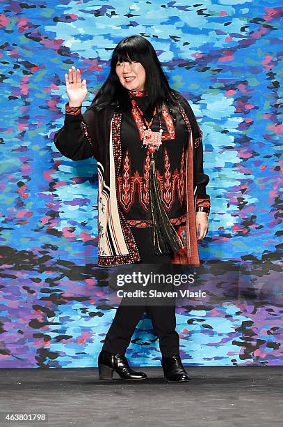 Designer Anna Sui poses on the runway at the Anna Sui fashion show during Mercedes-Benz Fashion Week Fall at The Theatre at Lincoln Center on...