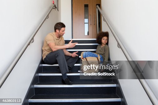 Teacher talking to Problem Child Teacher talking to Problem Child