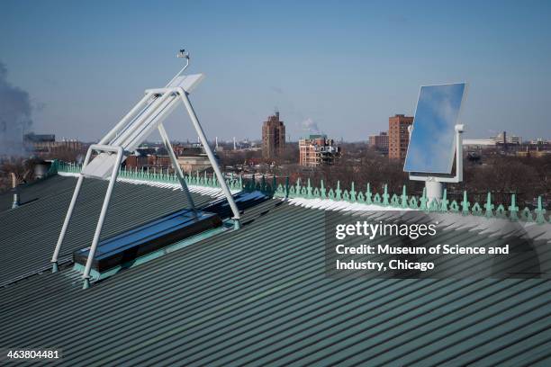 View of a heliostat installed on the roof of the Museum Of Science and Industry, Chicago, Illinois, used to reflect sunlight into the Science Storms...