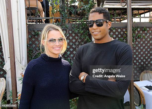 Amanda Hearst and Hassan Pierre with Rosario Dawson & Spotify host the Maison De Mode Oscar week lunch at Petit Ermitage on February 18, 2015 in West...