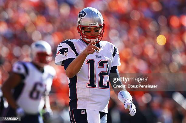 Tom Brady of the New England Patriots reacts in the first quarter against the Denver Broncos during the AFC Championship game at Sports Authority...