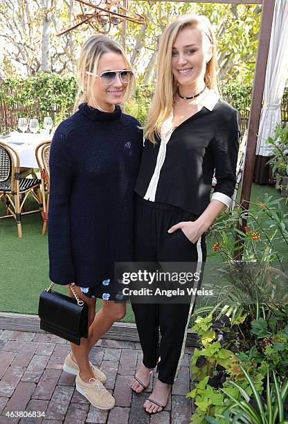 Amanda Hearst and Elizabeth Gilpin attend the Maison De Mode Oscar week lunch hosted by Rosario Dawson, Amanda Hearst, Hassan Pierre & Spotify at...