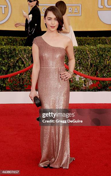 Actress Emilia Clarke arrives at the 20th Annual Screen Actors Guild Awards at The Shrine Auditorium on January 18, 2014 in Los Angeles, California.