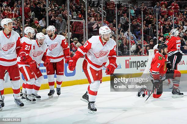 Darren Helm of the Detroit Red Wings skates toward the bench after scoring against the Chicago Blackhawks in the third period during the NHL game at...