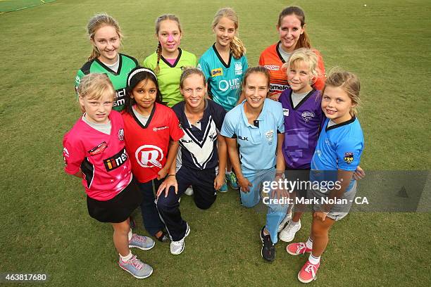 Elysse Perry and Meg Lanning pose during a Womens BBL Media opportunity at Manuka Oval on January 28, 2015 in Canberra, Australia.