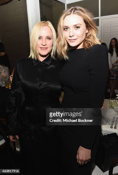 Actors Patricia Arquette and Elizabeth Olsen attend VANITY FAIR and Barneys New York Dinner benefiting OXFAM, hosted by Rooney Mara at Chateau...