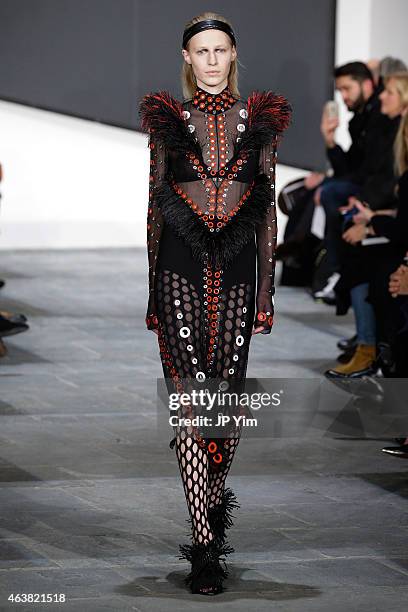 Model walks the runway at the Proenza Schouler show during Mercedes-Benz Fashion Week Fall 2015 at the Marcel Breuer Building on February 18, 2015 in...