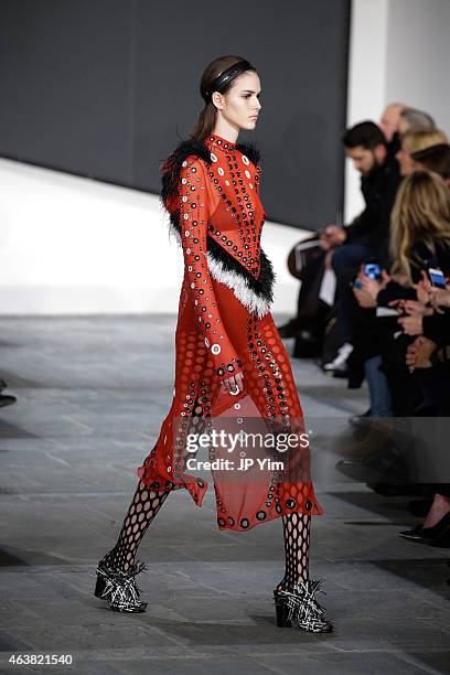 Model walks the runway at the Proenza Schouler show during Mercedes-Benz Fashion Week Fall 2015 at the Marcel Breuer Building on February 18, 2015 in...