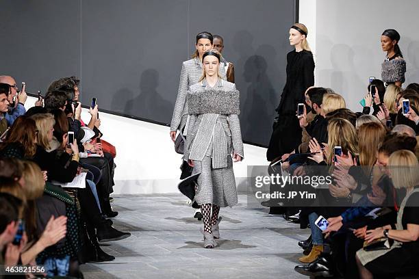 Models walk the runway at the Proenza Schouler show during Mercedes-Benz Fashion Week Fall 2015 at the Marcel Breuer Building on February 18, 2015 in...