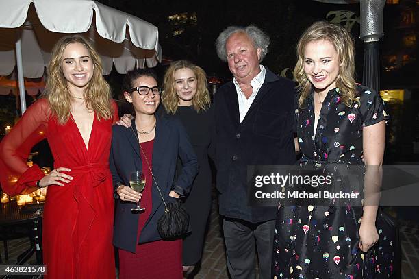 Actress Suki Waterhouse, guest, actress Elizabeth Olsen, Vanity Fair Editor In Chief Graydon Carter and TV personality Poppy Jamie attend VANITY FAIR...