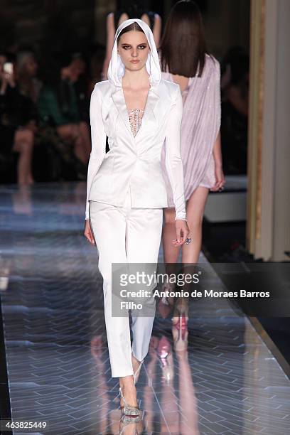 Model walks the runway during Atelier Versace show as part of Paris Fashion Week Haute-Couture Spring/Summer 2014 on January 19, 2014 in Paris,...