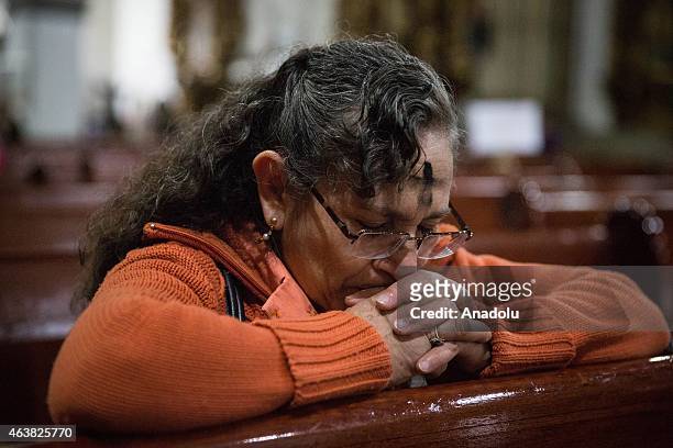 Catholic woman prays during the Ash Wednesday at the San Juan Bautista Church on February 18, 2015 in Mexico City, Mexico. Ash Wednesday marks the...
