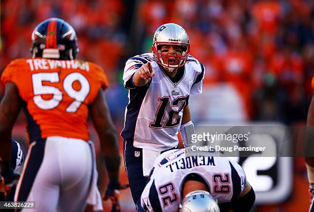 Tom Brady of the New England Patriots calls a play in the fourth quarter against the Denver Broncos during the AFC Championship game at Sports...