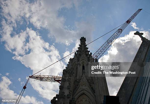 Repairs continue on the Washington National Cathedral's central tower after last month's 5.8 earthquake in Washington, D.C., on Thursday, September...