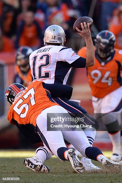 New England Patriots quarterback Tom Brady is sacked by Denver Broncos defensive end Jeremy Mincey in the fourth quarter. The Denver Broncos take on...