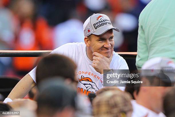 Peyton Manning of the Denver Broncos celebrates after they defeated the New England Patriots 26 to 16 during the AFC Championship game at Sports...