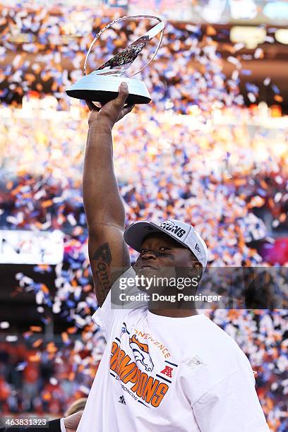 Demaryius Thomas of the Denver Broncos celebrates with the Lamar Hunt Trophy after they defeated the New England Patriots 26 to 16 in the AFC...