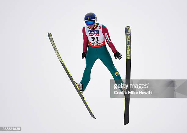 Jonas Sandell of Sweden practices during the Men's Normal Hill Ski Jumping training during the FIS Nordic World Ski Championships at the Lugnet venue...