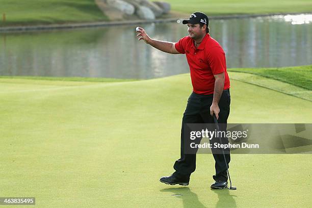 Patrick Reed acknowledges the gallery on the 18th hole after winning the Humana Challenge in partnership with the Clinton Foundation on the Arnold...