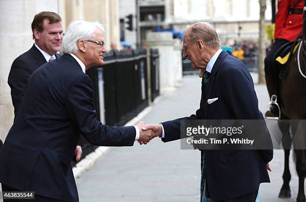 Queen Elizabeth II and Prince Philip, Duke of Edinburgh are greeted by Former Canadian Minister of Foreign Affairs John Baird and Gordon Campbell,...