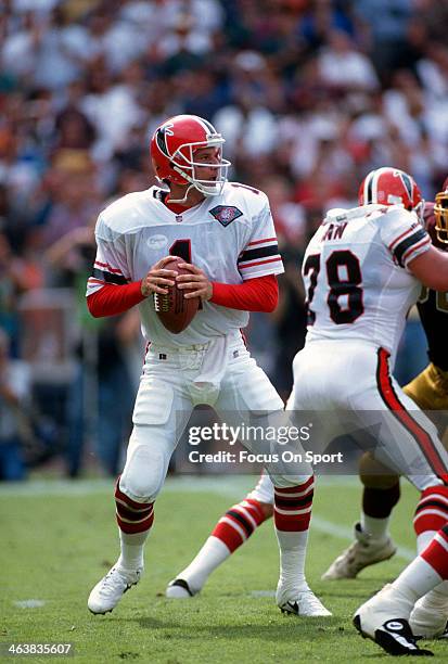 Jeff George of the Atlanta Falcons drops back to pass against the Washington Redskins during an NFL football game September 25, 1994 at RFK Stadium...