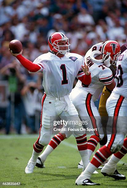 Jeff George of the Atlanta Falcons drops back to pass against the Washington Redskins during an NFL football game September 25, 1994 at RFK Stadium...