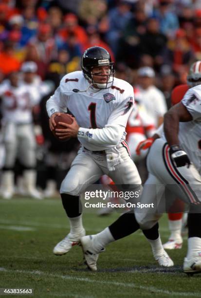 Jeff George of the Atlanta Falcons drops back to pass against the San Francisco 49ers during an NFL football game December 4, 1994 at Candlestick...