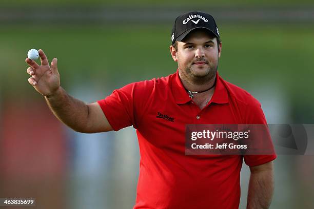 Patrick Reed acknowledges the gallery on the 18th green after winning the Humana Challenge in partnership with the Clinton Foundation on the Arnold...