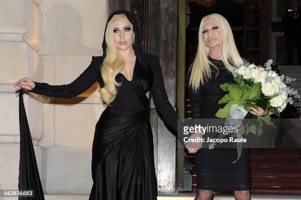 Lady Gaga and Donatella Versace attend the Atelier Versace show as part of Paris Fashion Week Haute Couture Spring/Summer 2014 on January 19, 2014 in...