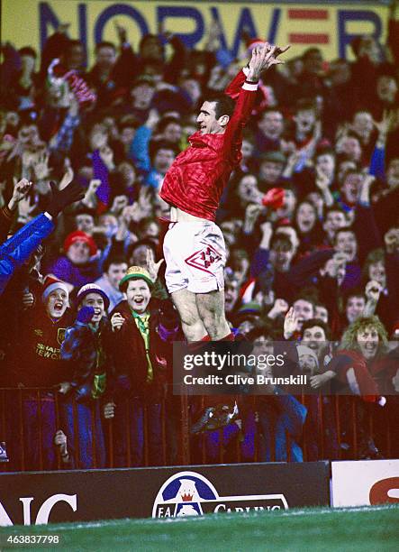 Manchester United player Eric Cantona celebrates his 2nd goal in a 3-1 Premier League win over Aston Villa at Old Trafford on December 19, 1993 in...