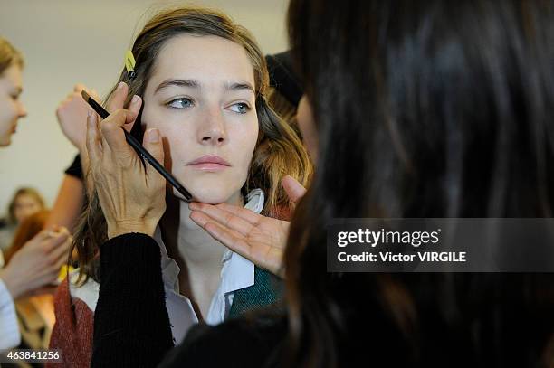 Model backstage at the Michael Kors fashion show during Mercedes-Benz Fashion Week Fall on February 18, 2015 in New York City.