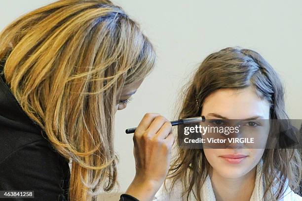 Model backstage at the Michael Kors fashion show during Mercedes-Benz Fashion Week Fall on February 18, 2015 in New York City.