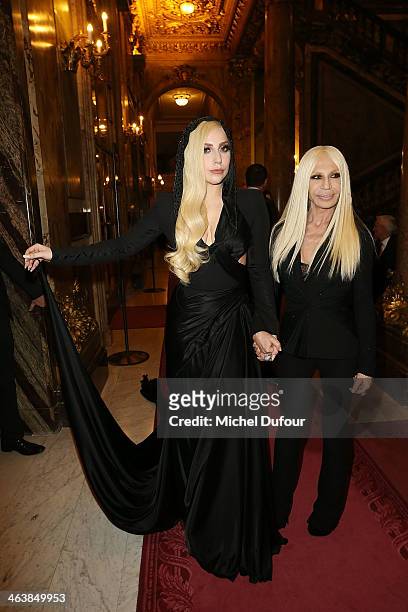 Lady Gaga and Donatella Versace attend the Atelier Versace show as part of Paris Fashion Week Haute Couture Spring/Summer 2014 on January 19, 2014 in...