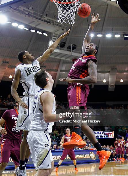 Cadarian Raines of the Virginia Tech Hokies shoots the ball against V.J. Beachem of the Notre Dame Fighting Irish at Purcel Pavilion on January 19,...