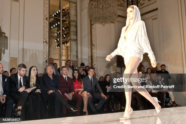 Guest, Singer Lady Gaga, Mario Testino, actor Alan Ritchson, Karine Ferri and actor Nolan Gerard Funk attend the Atelier Versace show as part of...