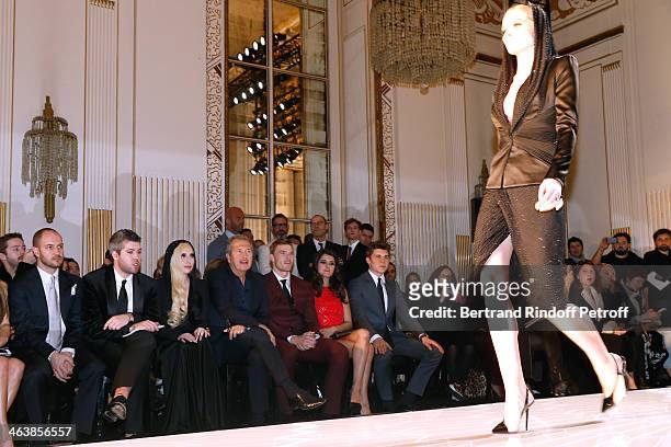 Singer Lady Gaga, Mario Testino, singer Alan Ritchson, Karine Ferri and actor Nolan Gerard Funk attend the Atelier Versace show as part of Paris...