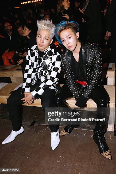 South Korean personality Taeyang with South Korean singer and producer G-Dragon attends the Saint Laurent Menswear Fall/Winter 2014-2015 Show as part...