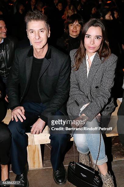 Singer Etienne Daho and actress Elodie Bouchez attend the Saint Laurent Menswear Fall/Winter 2014-2015 Show as part of Paris Fashion Week on January...