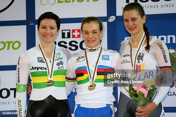 Silver medalist Anna Meares of Australia, gold medalist Anastasia Voynova of Russia and bronze medalist Miriam Vellte of Germany pose with the medals...