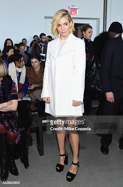 Actress Sienna Miller attends the Calvin Klein Collection fashion show during Mercedes-Benz Fashion Week Fall 2015 at Spring Studios on February 19,...