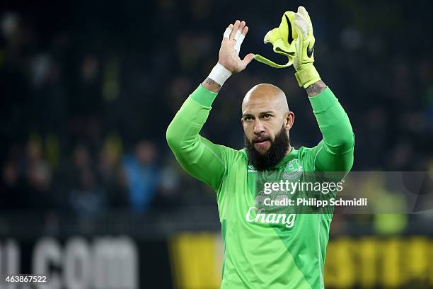 Tim Howard of Everton FC celebrates victory after the UEFA Europa League Round of 32 match between BSC Young Boys and Everton FC at Stade de Suisse,...