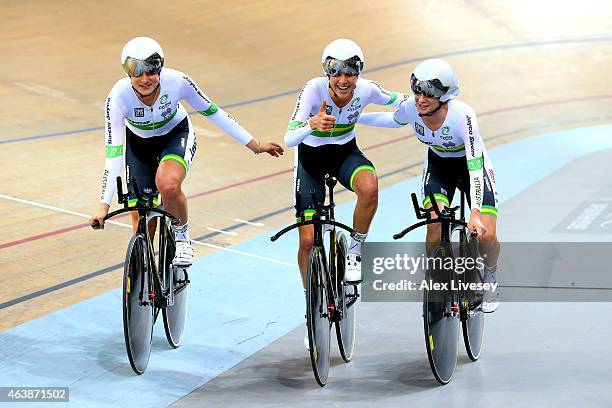 Melissa Hoskins, Ashlee Ankudinoff and Amy Cure of Australia celebrate winning gold in the Women's Team Pursuit Final during day two of the UCI Track...