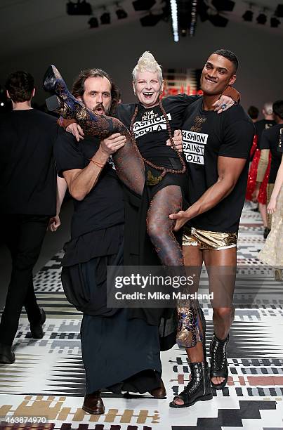 Andreas Kronthaler, Vivienne Westwood and a model walk the runway at the Fashion For Relief charity fashion show to kick off London Fashion Week...