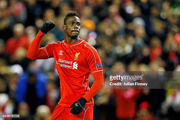 Mario Balotelli of Liverpool celebrates after scoring the opening goal from the penalty spot during the UEFA Europa League Round of 32 match between...