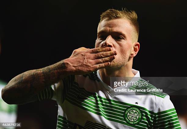 John Guidetti of Celtic celebrates as he scores their third and equalising goal during the UEFA Europa League Round of 32 first leg match between...